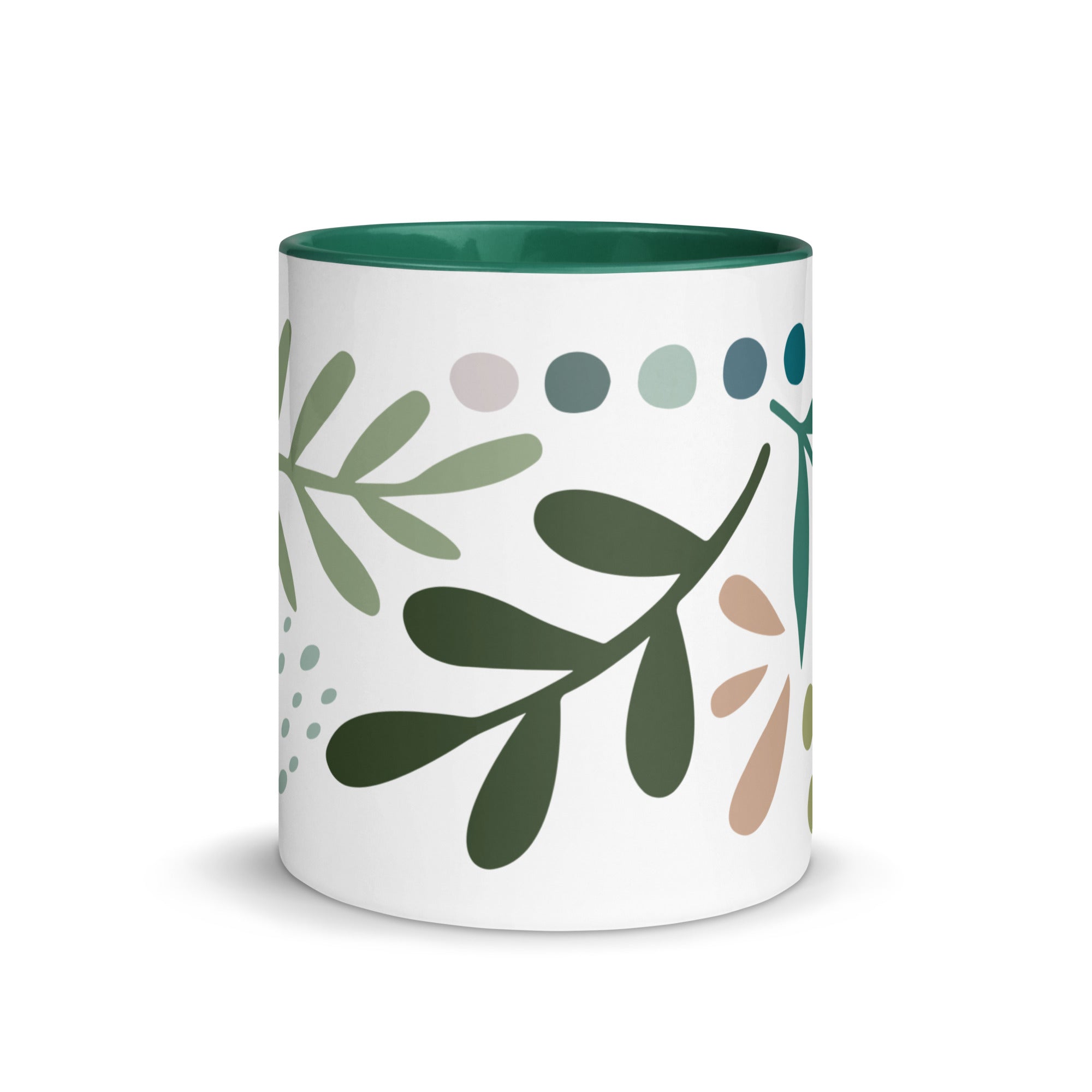 green mug with leaf print