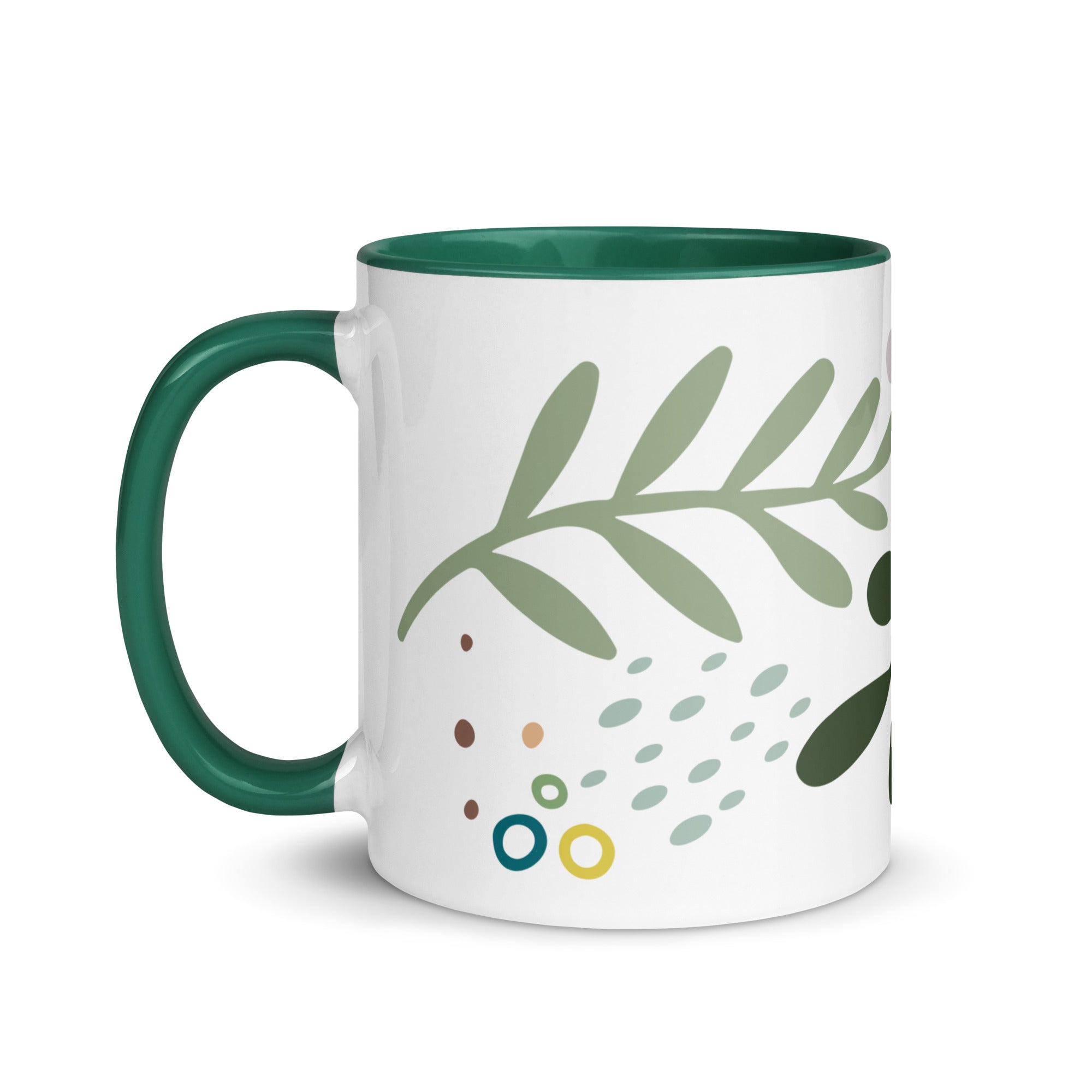 green leaf print mug with white outside green handle green interior