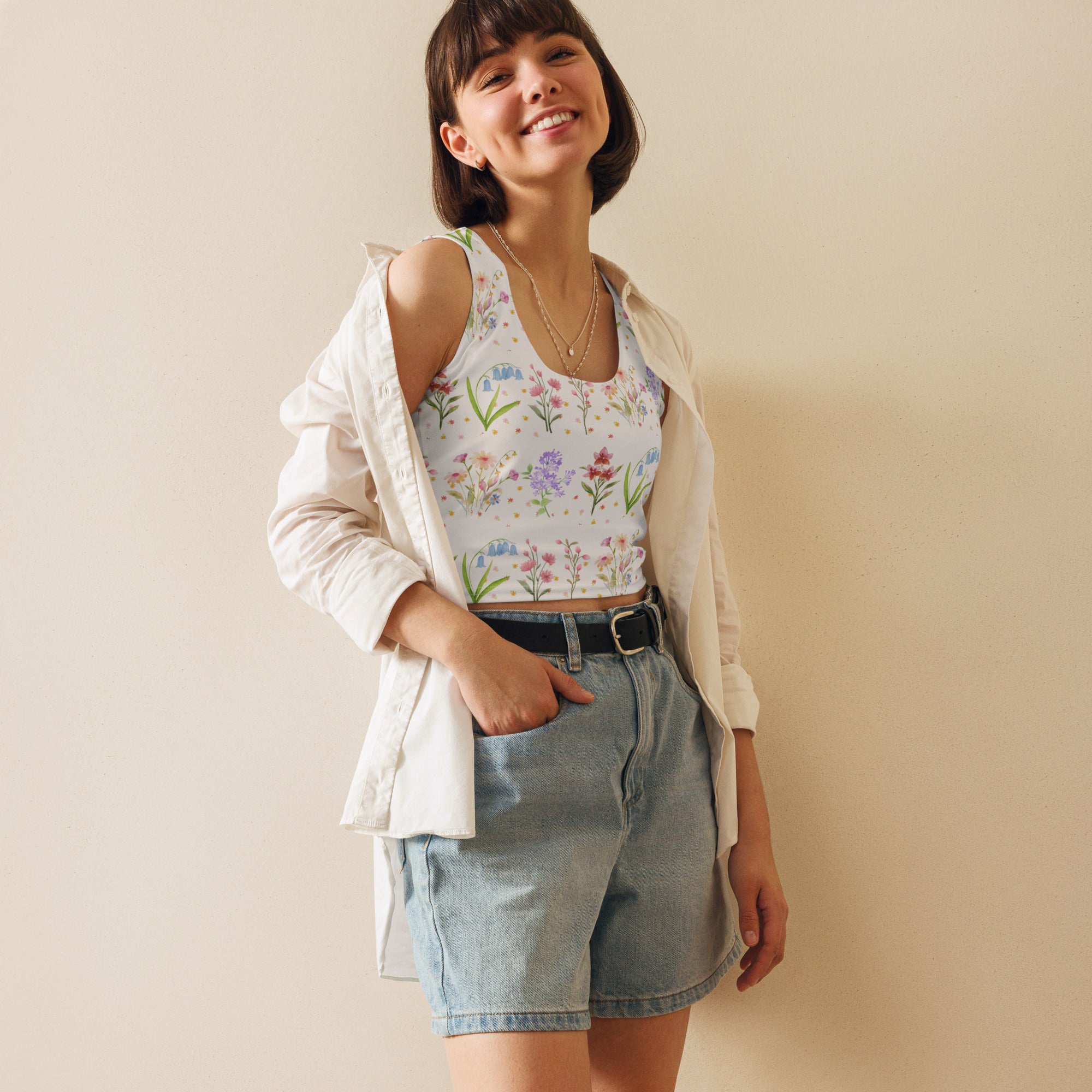 white womens tank top fitted with spring flowers printed all over