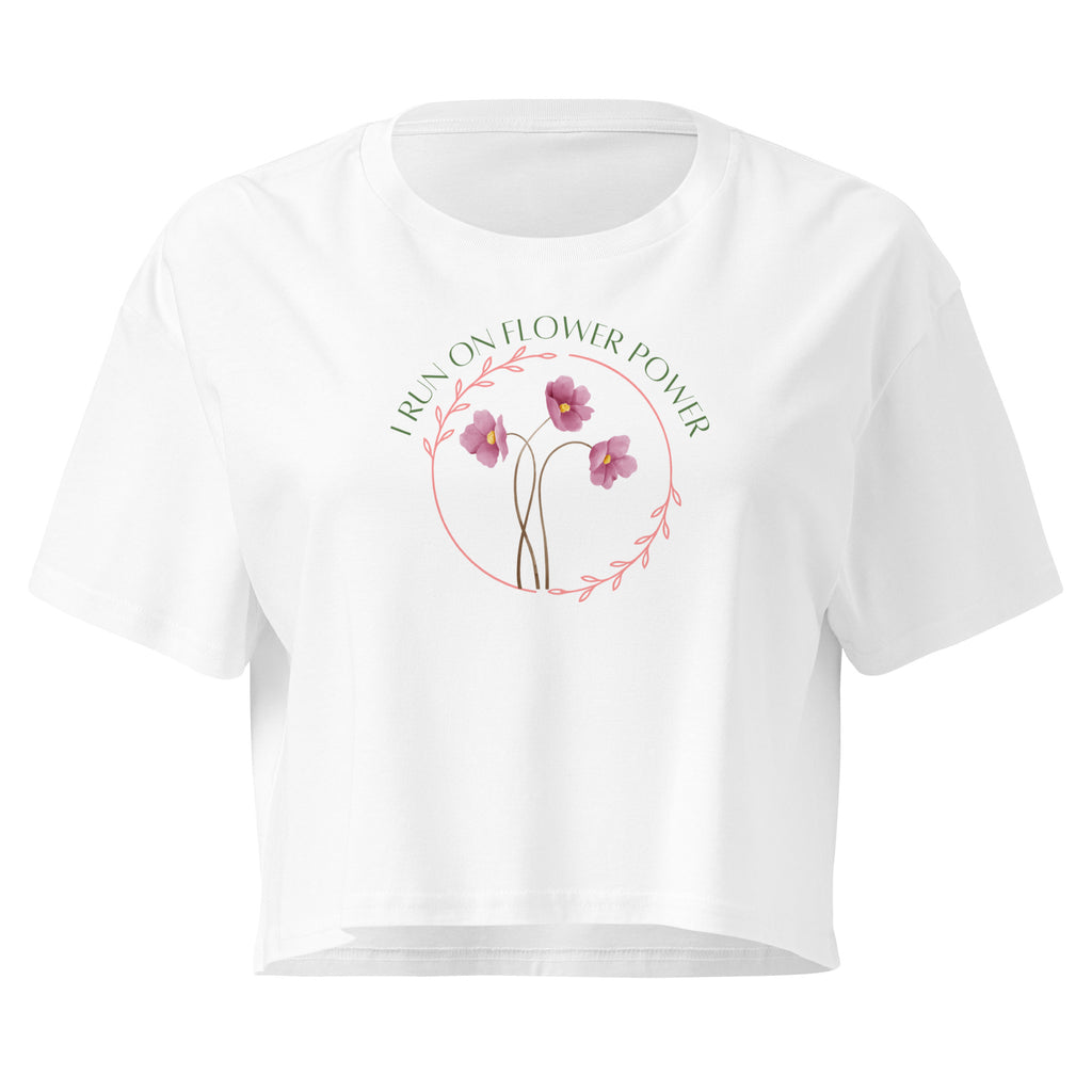 White t-shirt with floral design and text on a white background
